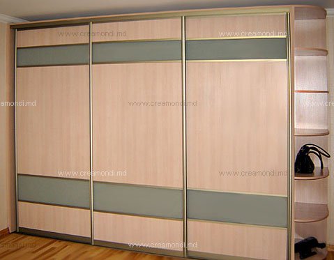 Sliding door wardrobesSliding door wardrobe: light panels are built up in the golden frame