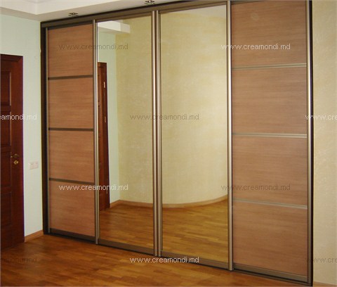 Sliding door wardrobesThat am I all over: mirror and laminated chipboard