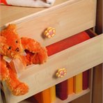 Coloured handles KIDS GUMMI in the nursery room